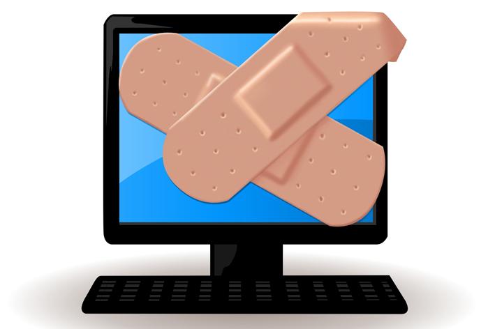Band-aid on computer screen - Support is ending for Windows XP- what does this mean for you ...